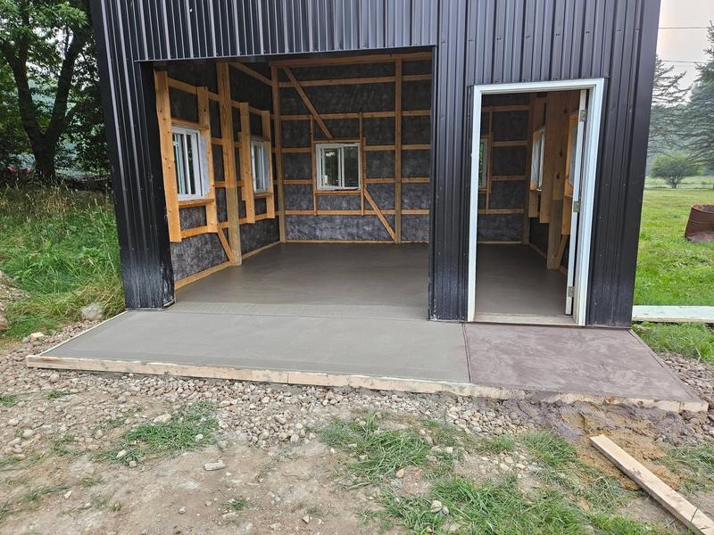 Concrete floor and apron poured at a pole-barn entrance